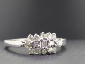 STUNNING BAGUETTE AND ROUND BRILLIANT CUT 9 CARAT GOLD CLUSTER RING