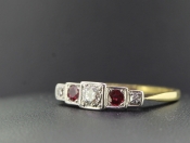 PRETTY RUBY AND DIAMOND PLATINUM AND 18 CARAT GOLD BAND