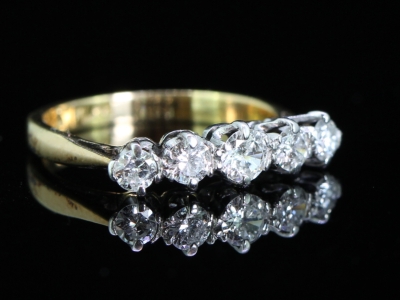 Dramatic 5 Stone Platinum and 18 Carat Gold Ring