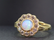  PRETTY OPAL AND DIAMOND CLUSTER 18 CARAT GOLD RING