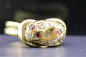 GORGEOUS DOUBLE SNAKE RUBY AND DIAMOND 18 CARAT GOLD RING