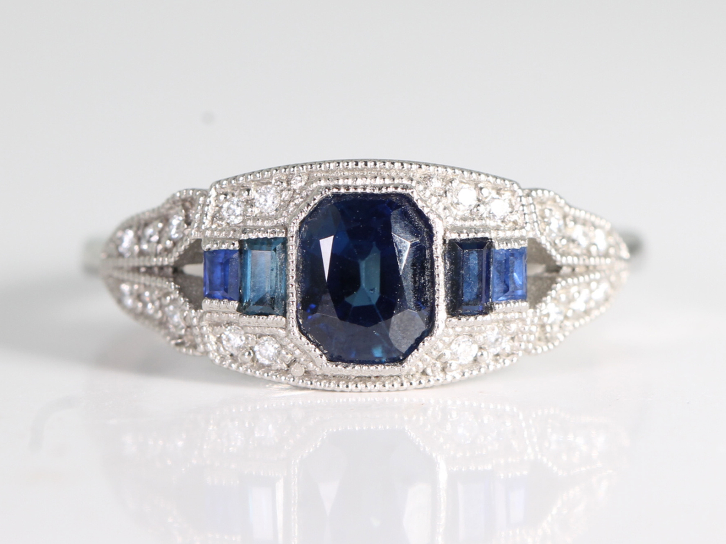 Art deco style sapphire and diamond platinum ring