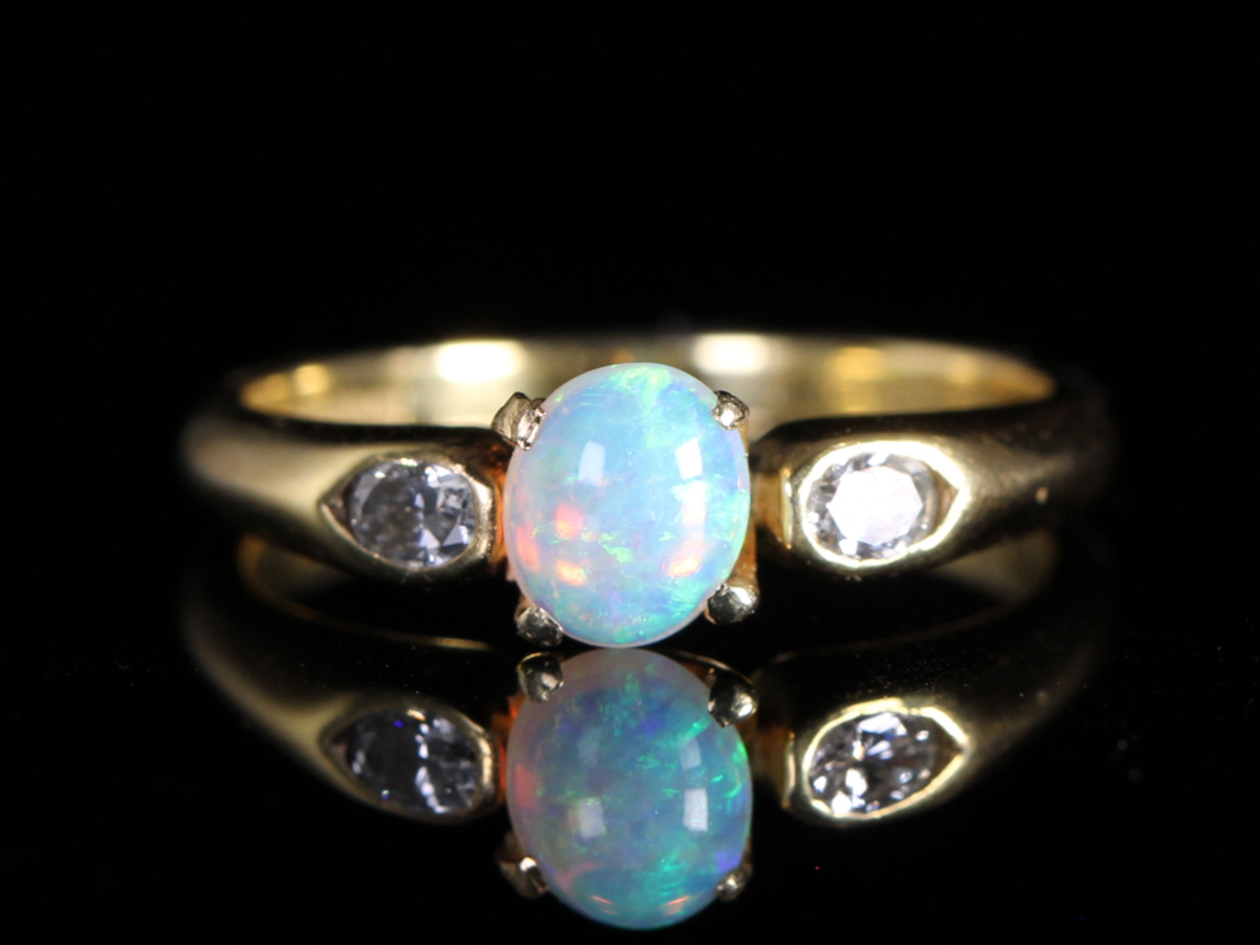 Vintage opal and diamond 18ct gold trilogy ring
