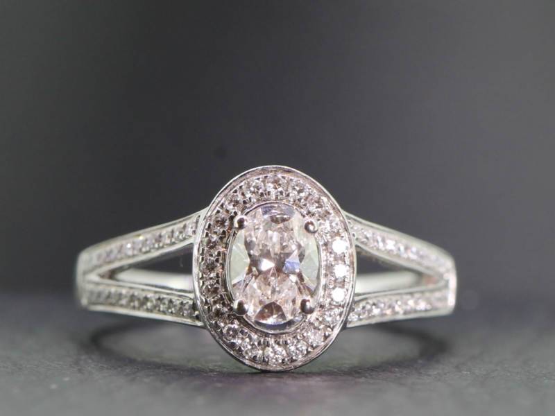 Elegant diamond 18 carat gold halo ring  