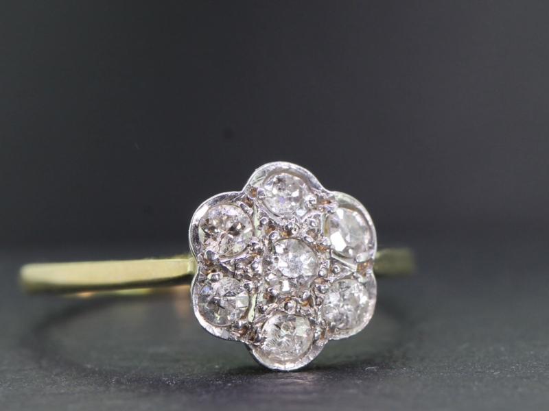 Beautiful edwardian diamond daisy 18 carat gold ring