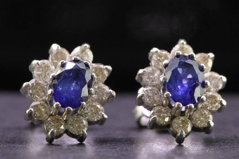 Striking pair of sapphire and diamond 18 carat gold stud earrings