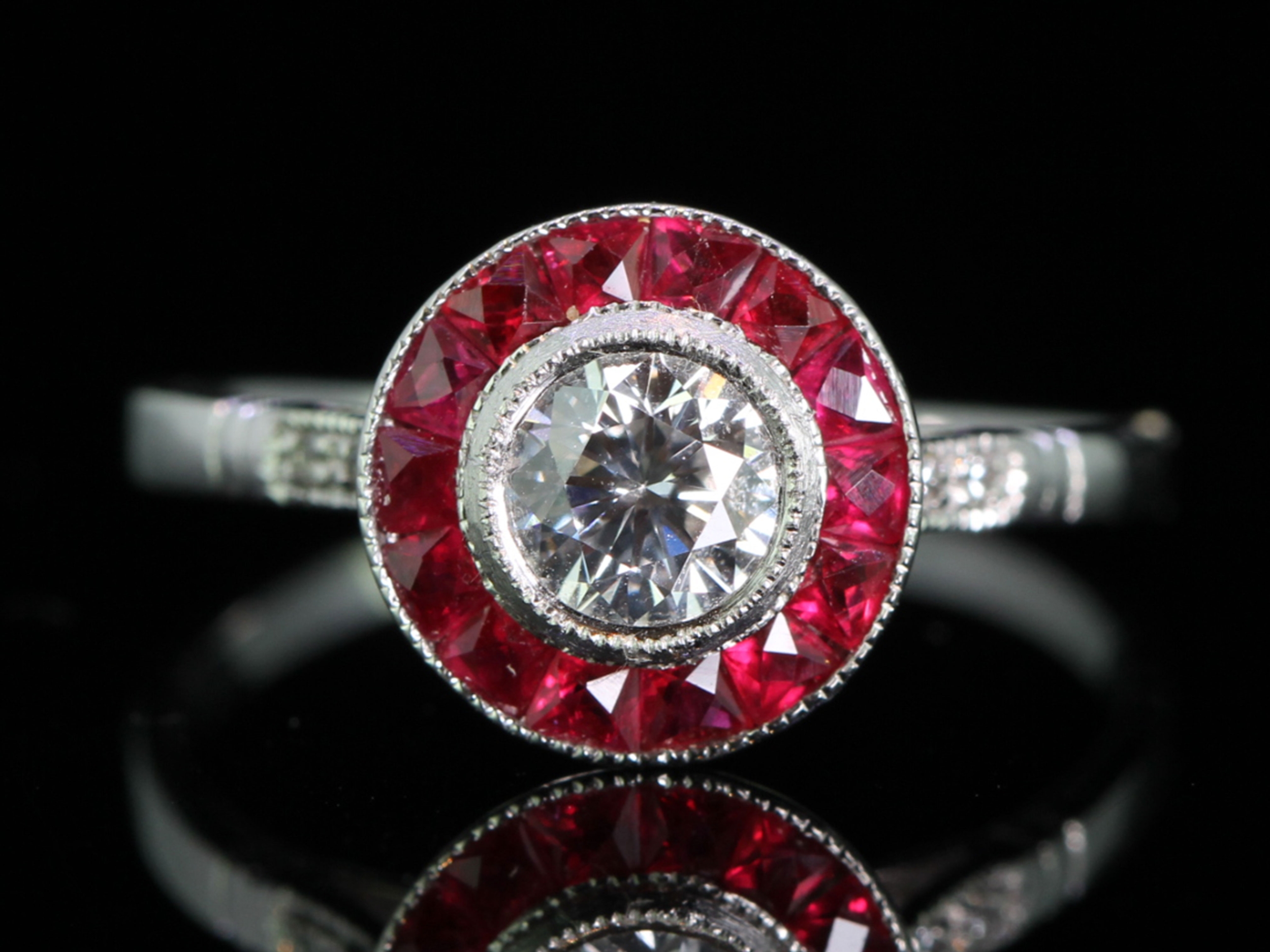 Art deco style .43 carat center vintage diamond and ruby ring