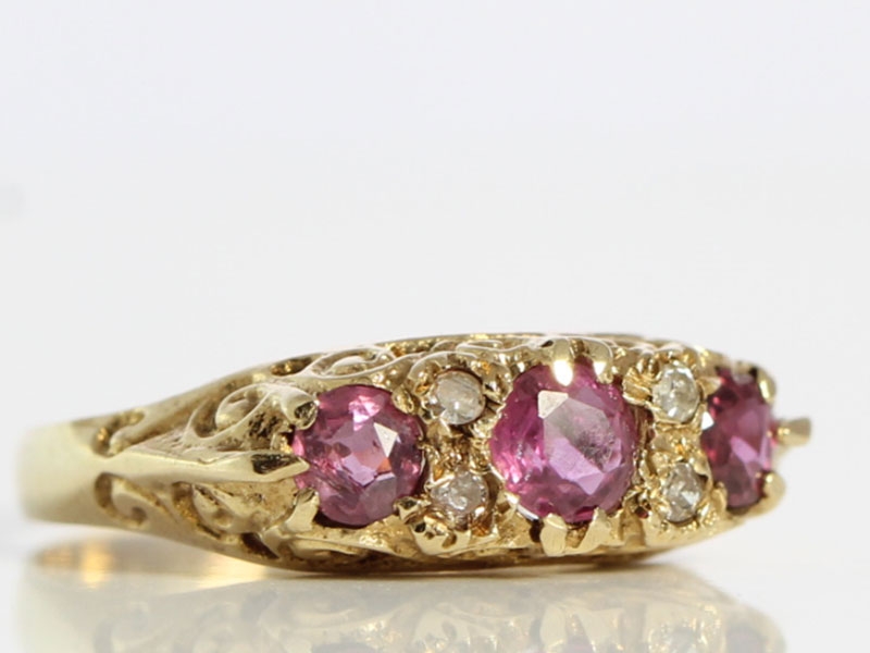 Beautiful ruby and diamond 9 carat gold gypsy ring