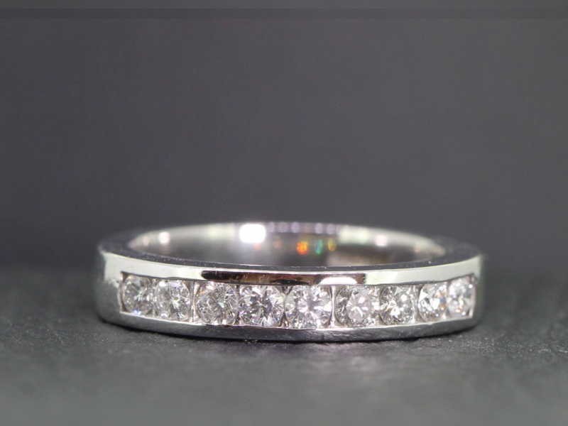 Elegant diamond 18 carat white gold half eternity ring