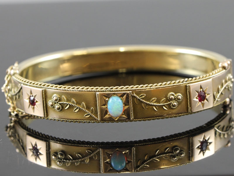 Fabulous victorian opal and ruby set 9 carat gold bangle