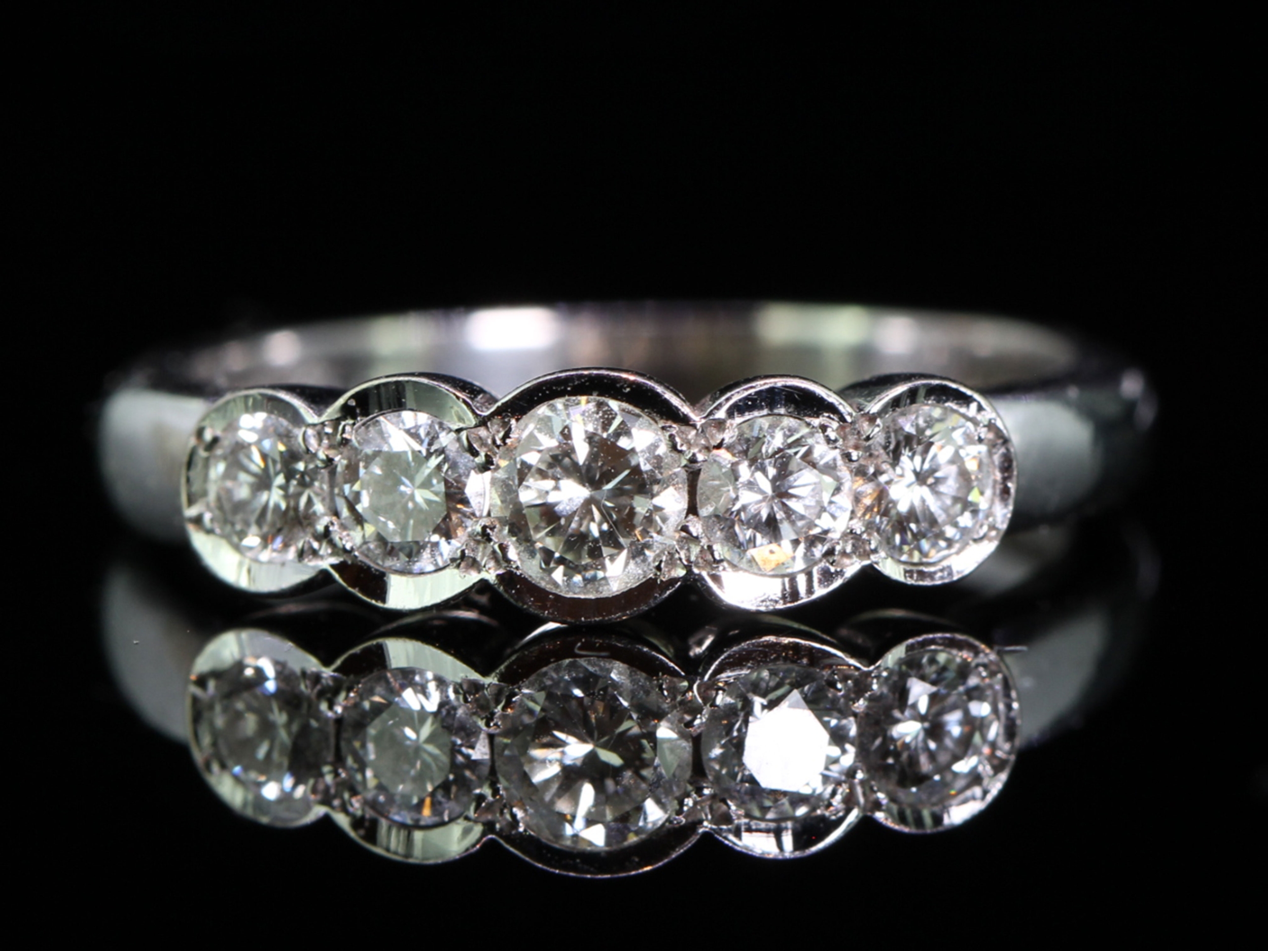 Glamorous five stone diamond 18 carat  gold  ring