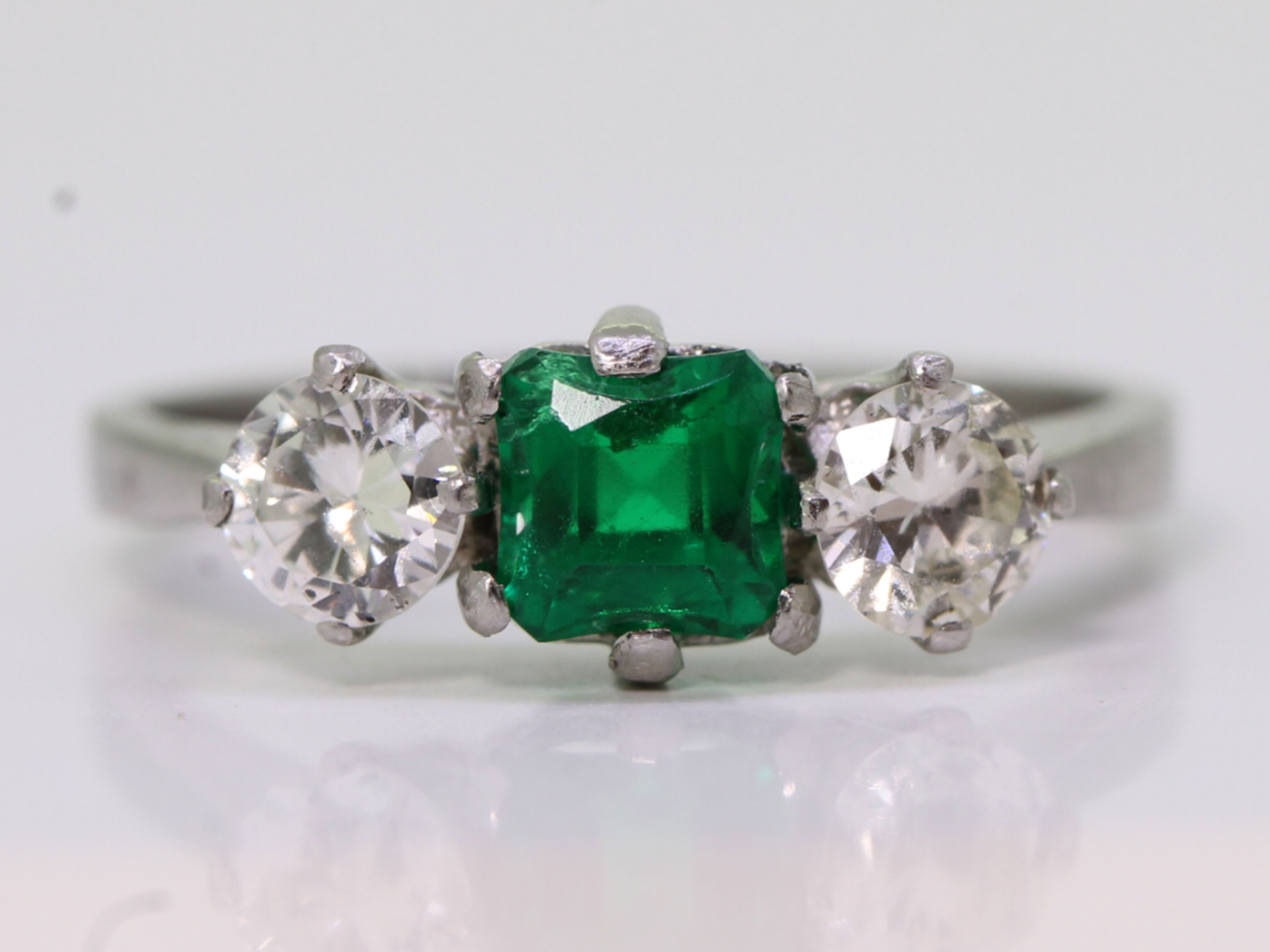 Art deco colombian emerald and diamond platinum trilogy ring