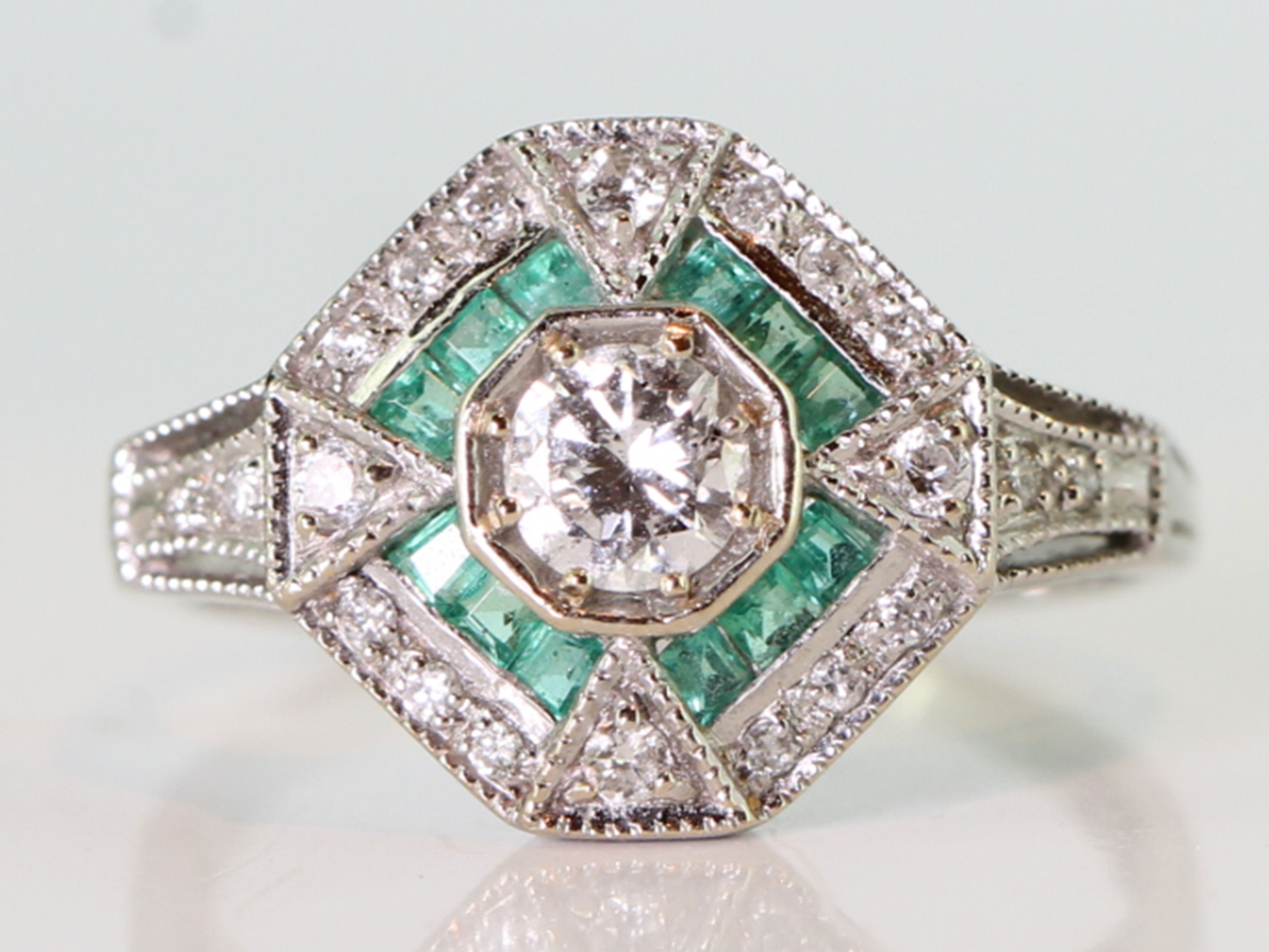 Stunning art deco inspired emerald and diamond 18 carat gold ring