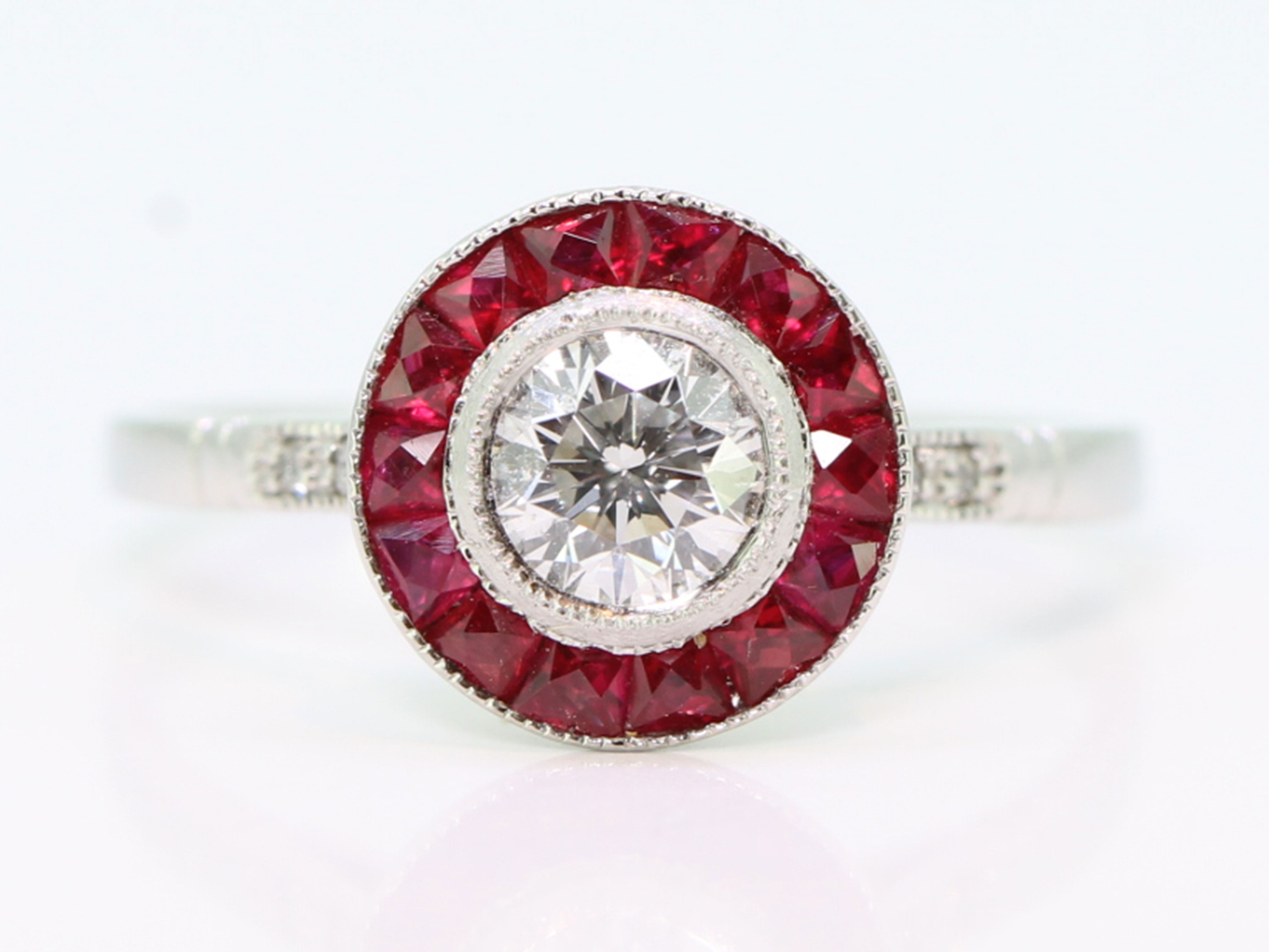 Art deco style .43 carat center vintage diamond and ruby ring
