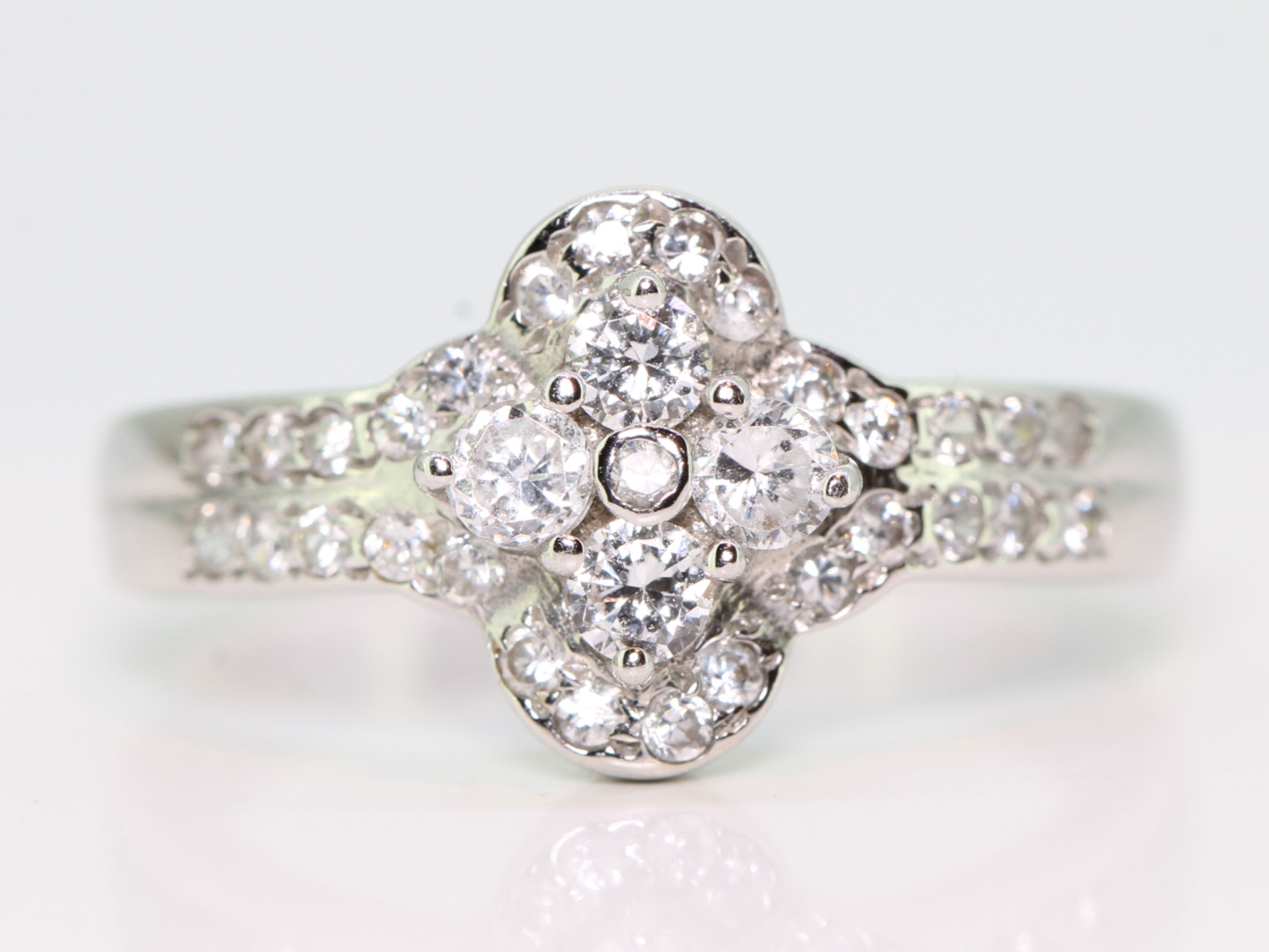 Opulent diamond cluster 18 carat gold ring