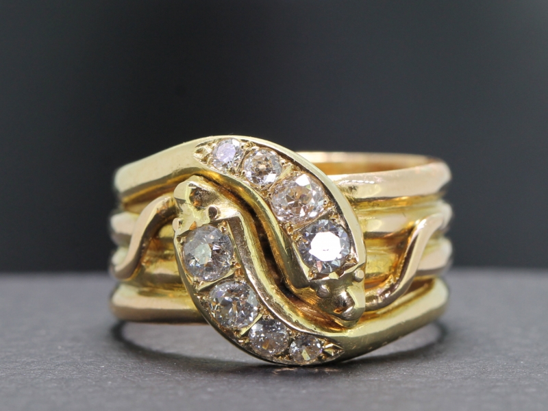 Gorgeous 18 carat gold diamond double snake ring dated 1908