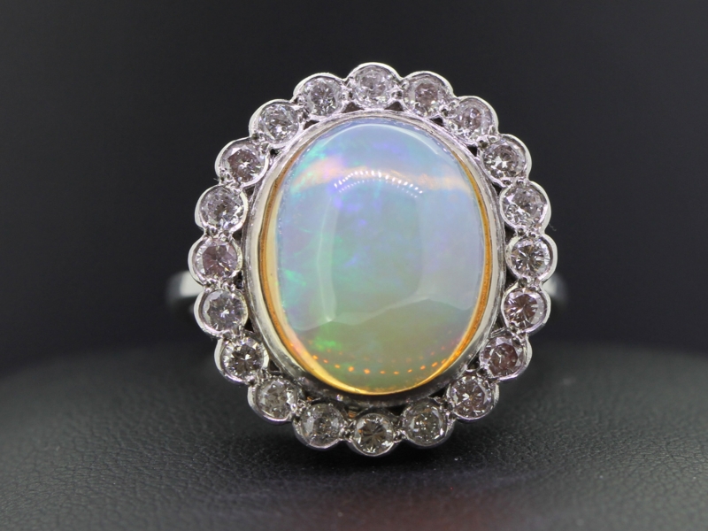  magnificent opal and diamond 18 carat gold cluster ring