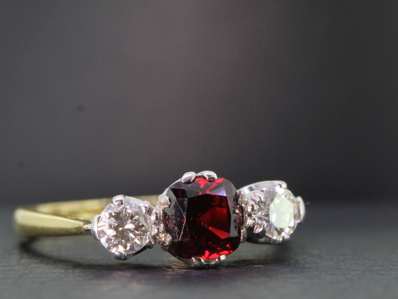Stunning natural ruby and diamond 18 carat gold trilogy ring