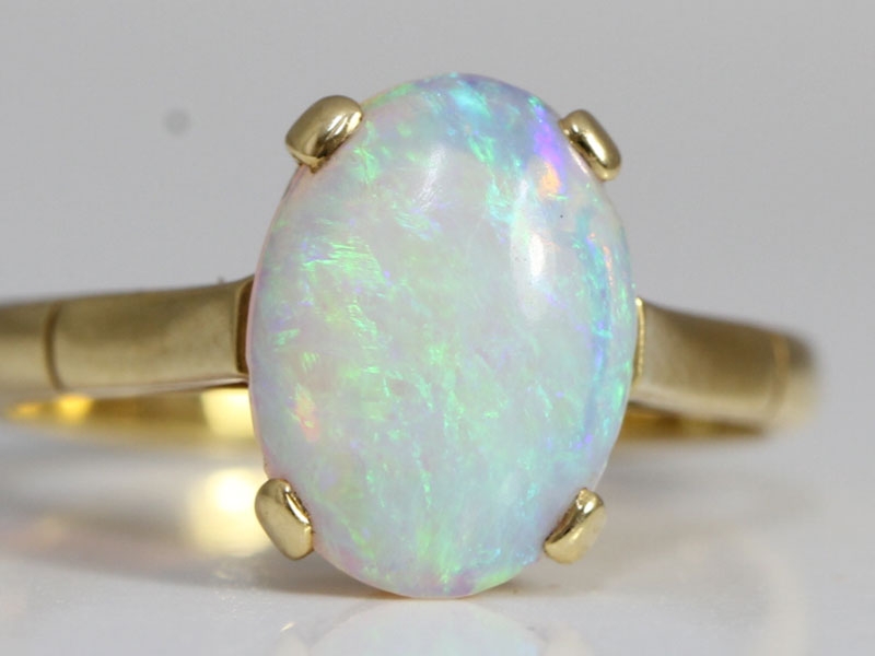 Enchanting art deco australian opal 18 carat gold ring 