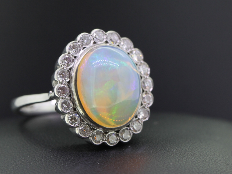  magnificent opal and diamond 18 carat gold cluster ring