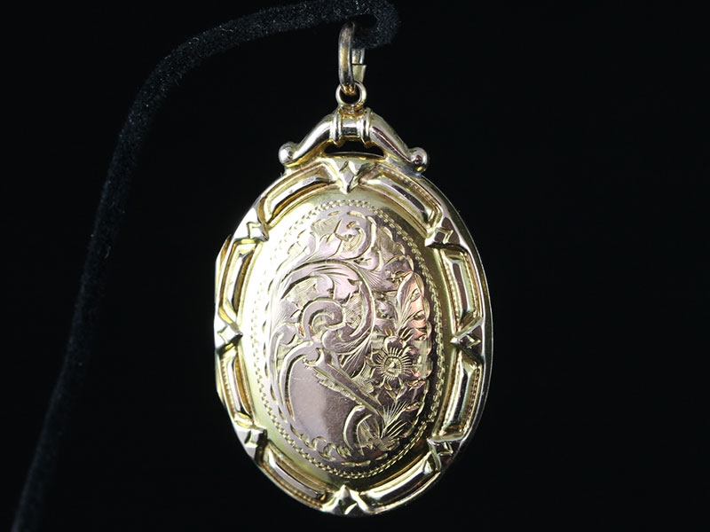 Wonderful edwardian oval engraved 9 carat gold locket
