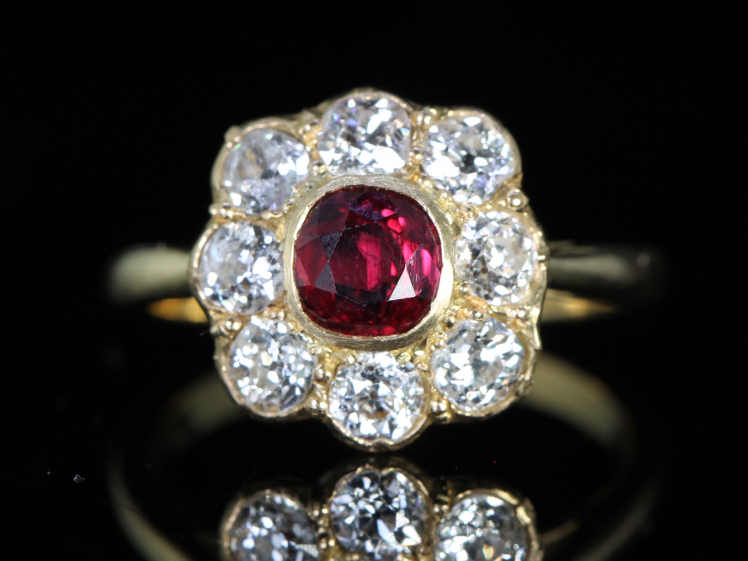 Vintage ruby and diamond 18ct gold cluster ring