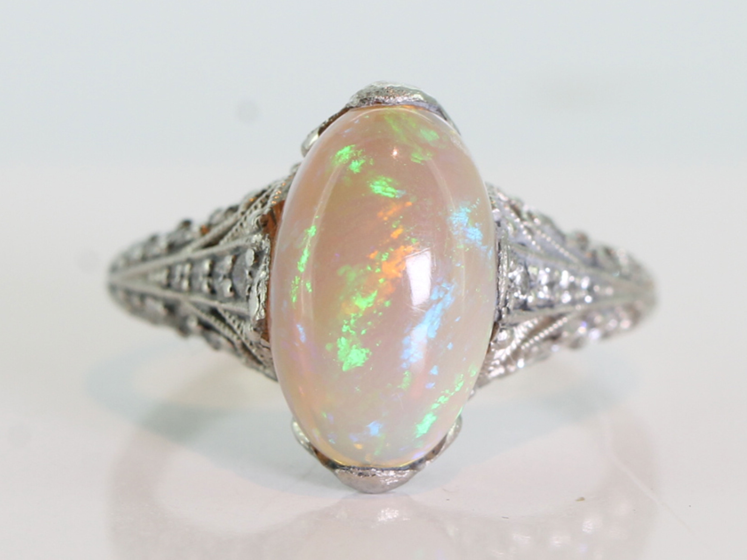Glorious black crystal opal and diamond  platinum ring