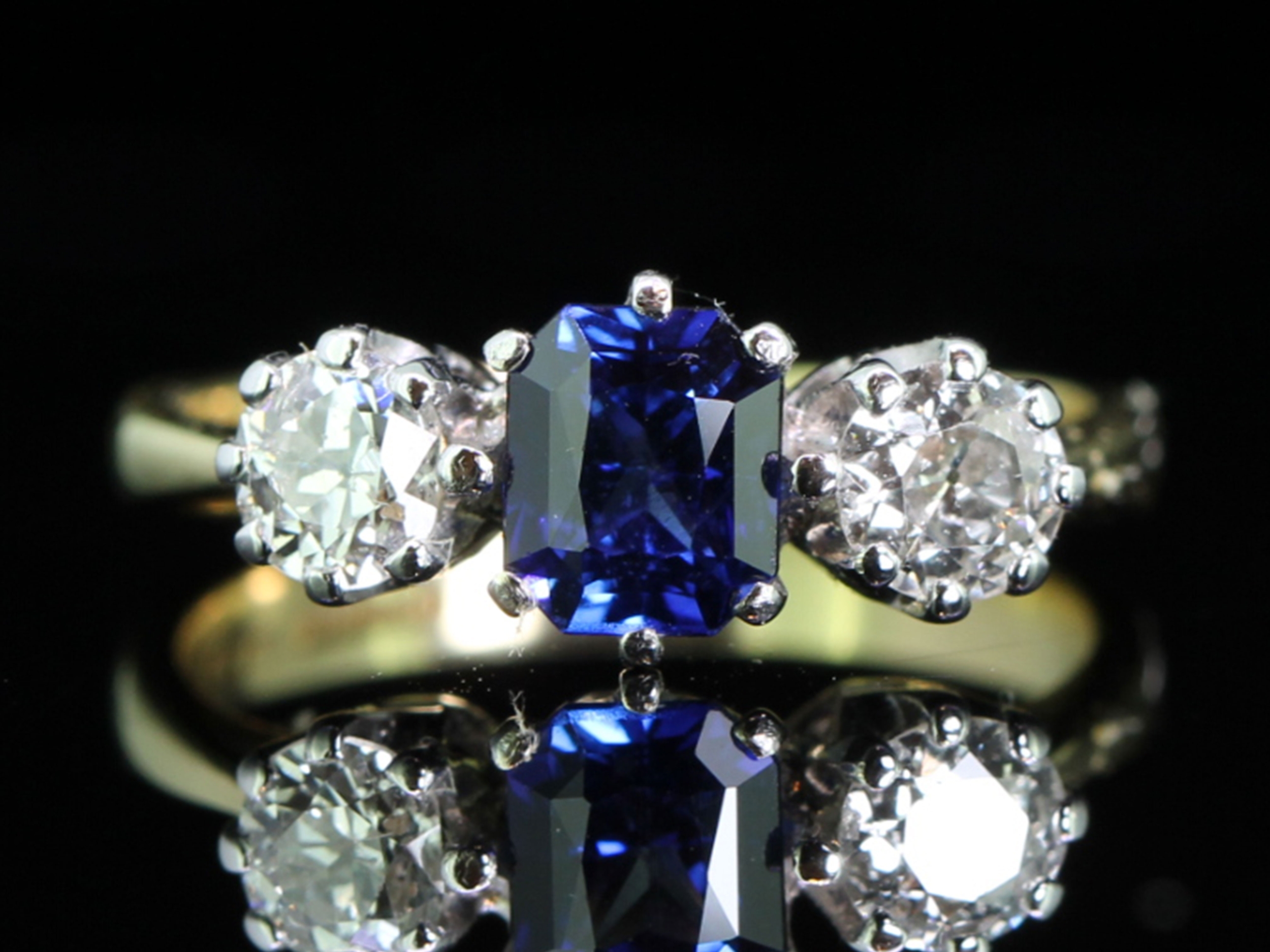 Ceylon sapphire and diamond 18 carat gold trilogy ring