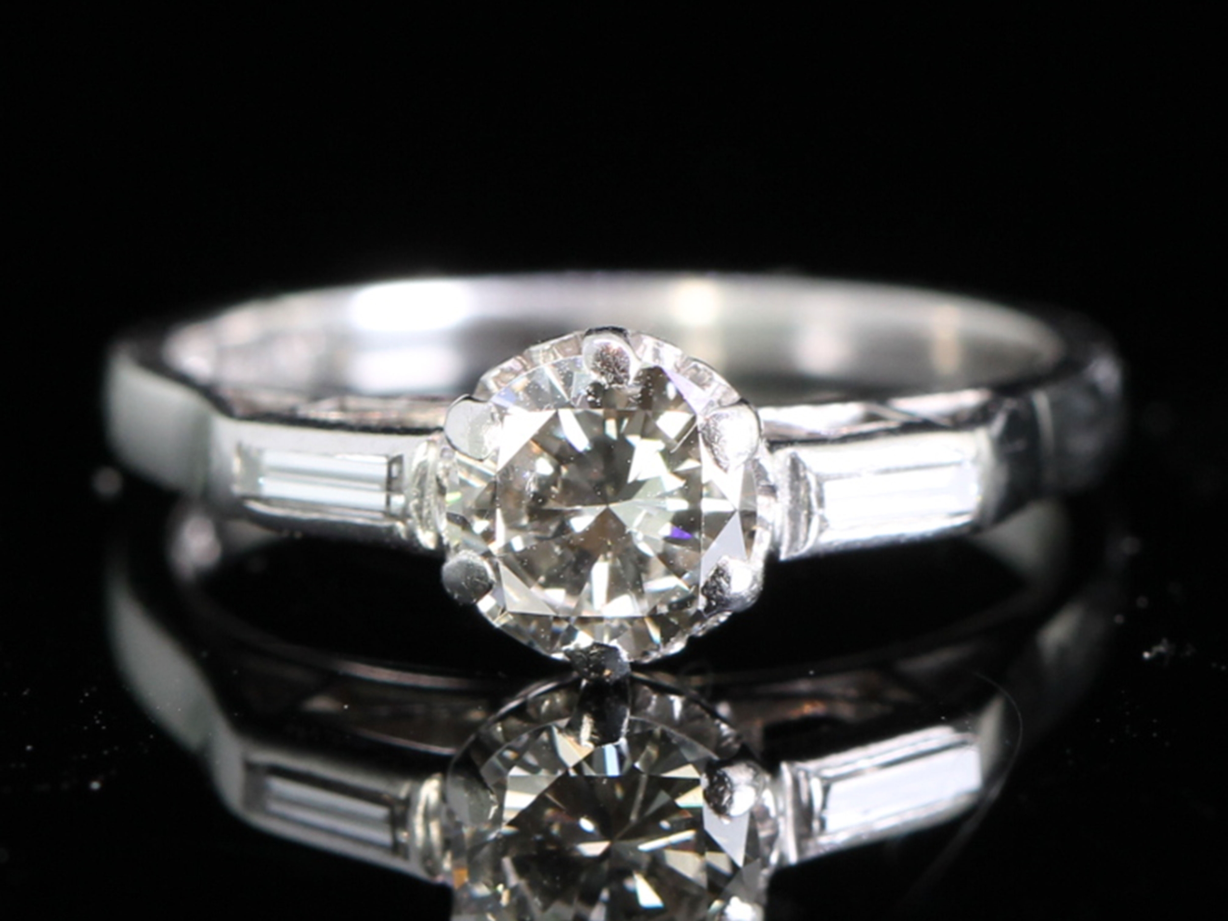 Circa 1950s diamond solitaire platinum ring