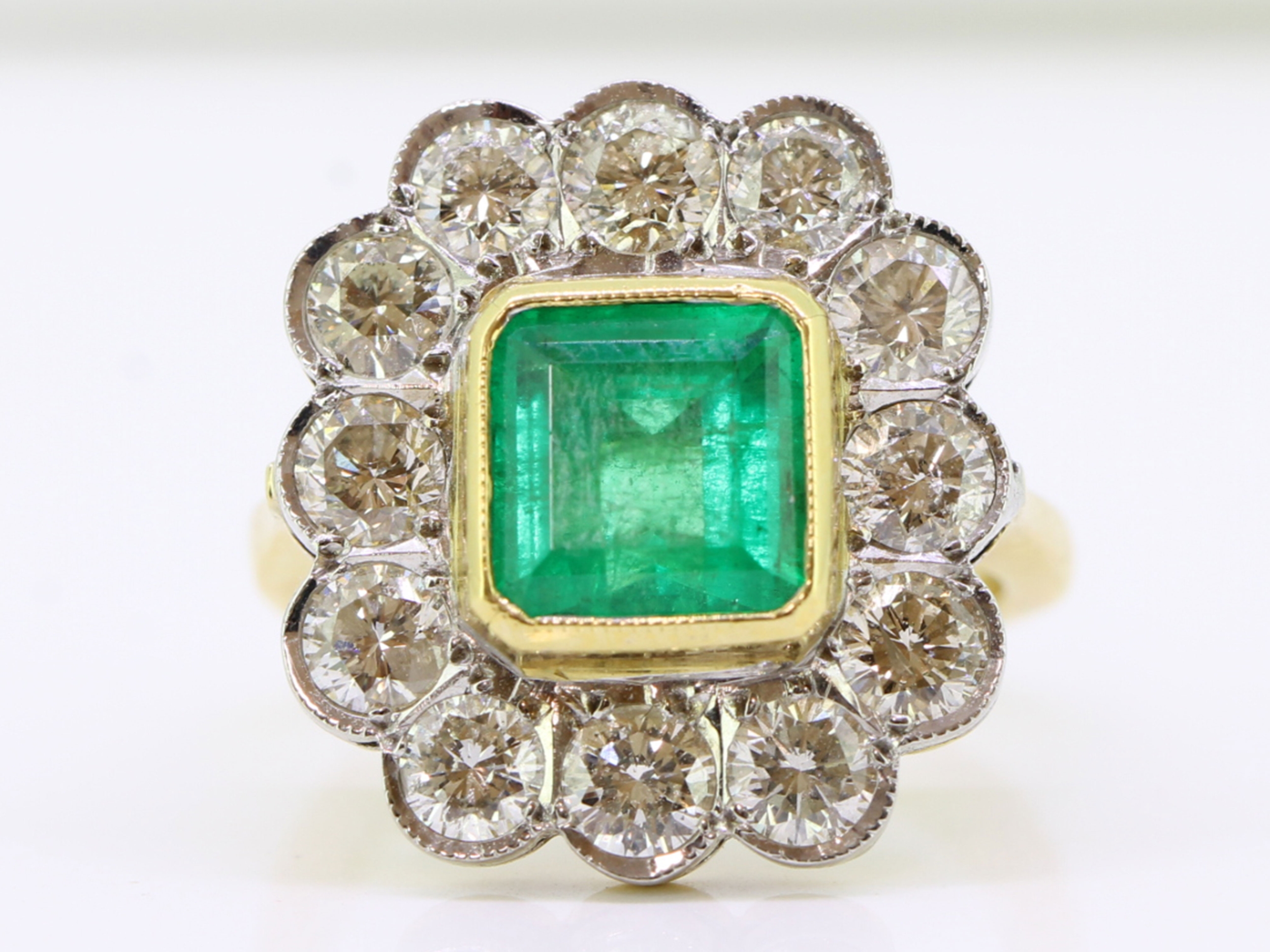 Spectacular colombian emerald and diamond 18 carat gold cluster ring 