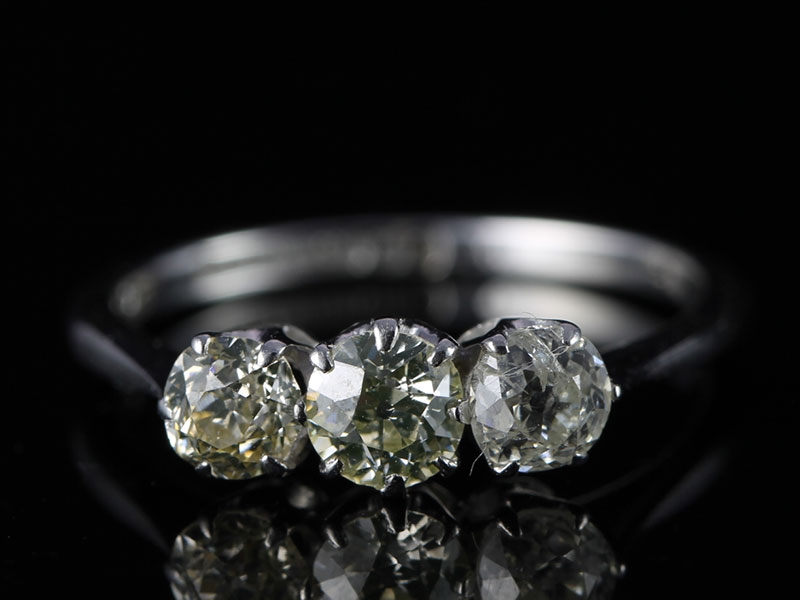 Adorable three stone diamond 18 carat gold and platinum ring