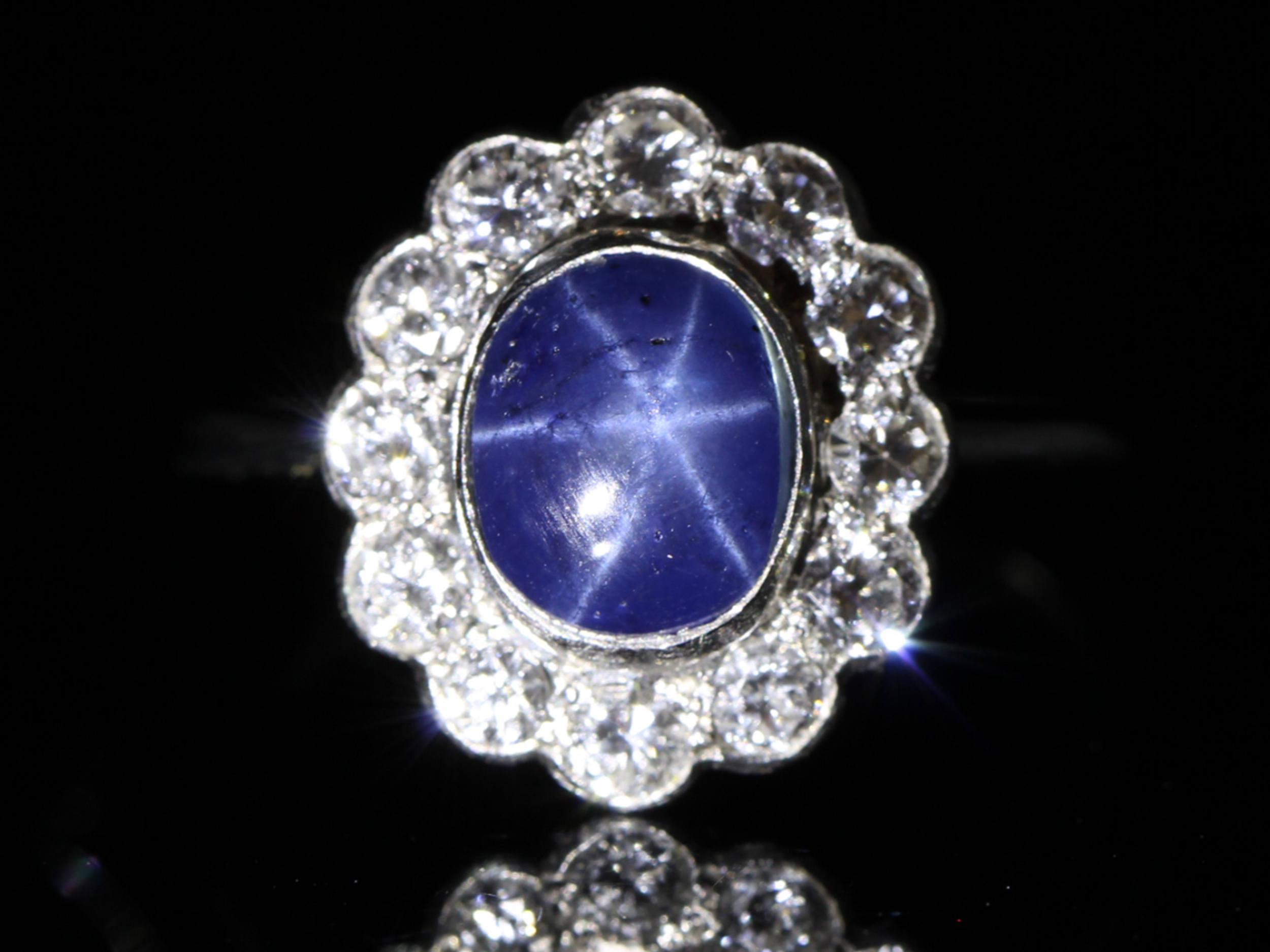 Vintage star sapphire and diamond cluster platinum ring 