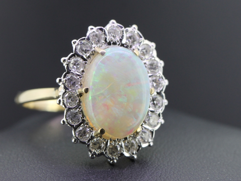 Gorgeous opal and diamond 9 carat gold cluter ring