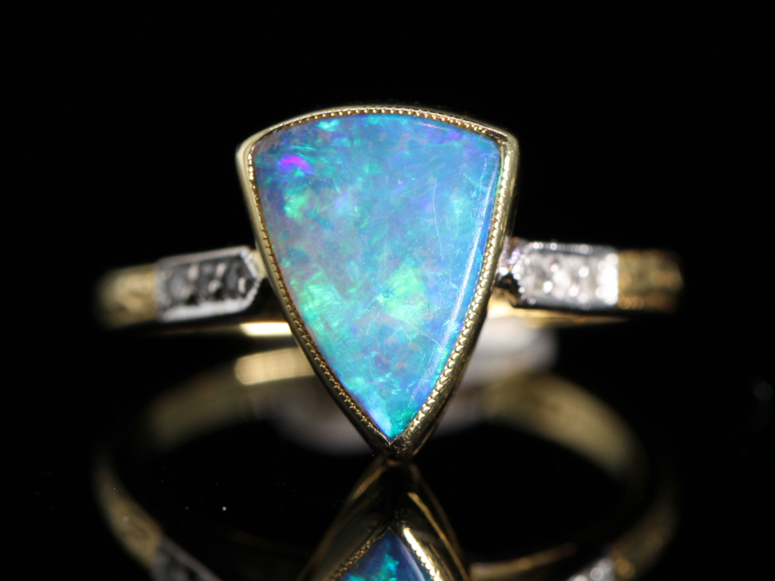 Vintage trillion cut black opal and diamond 18ct gold ring 