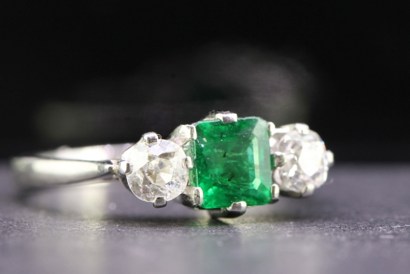  pretty emerald and diamond platinum gold trilogy ring