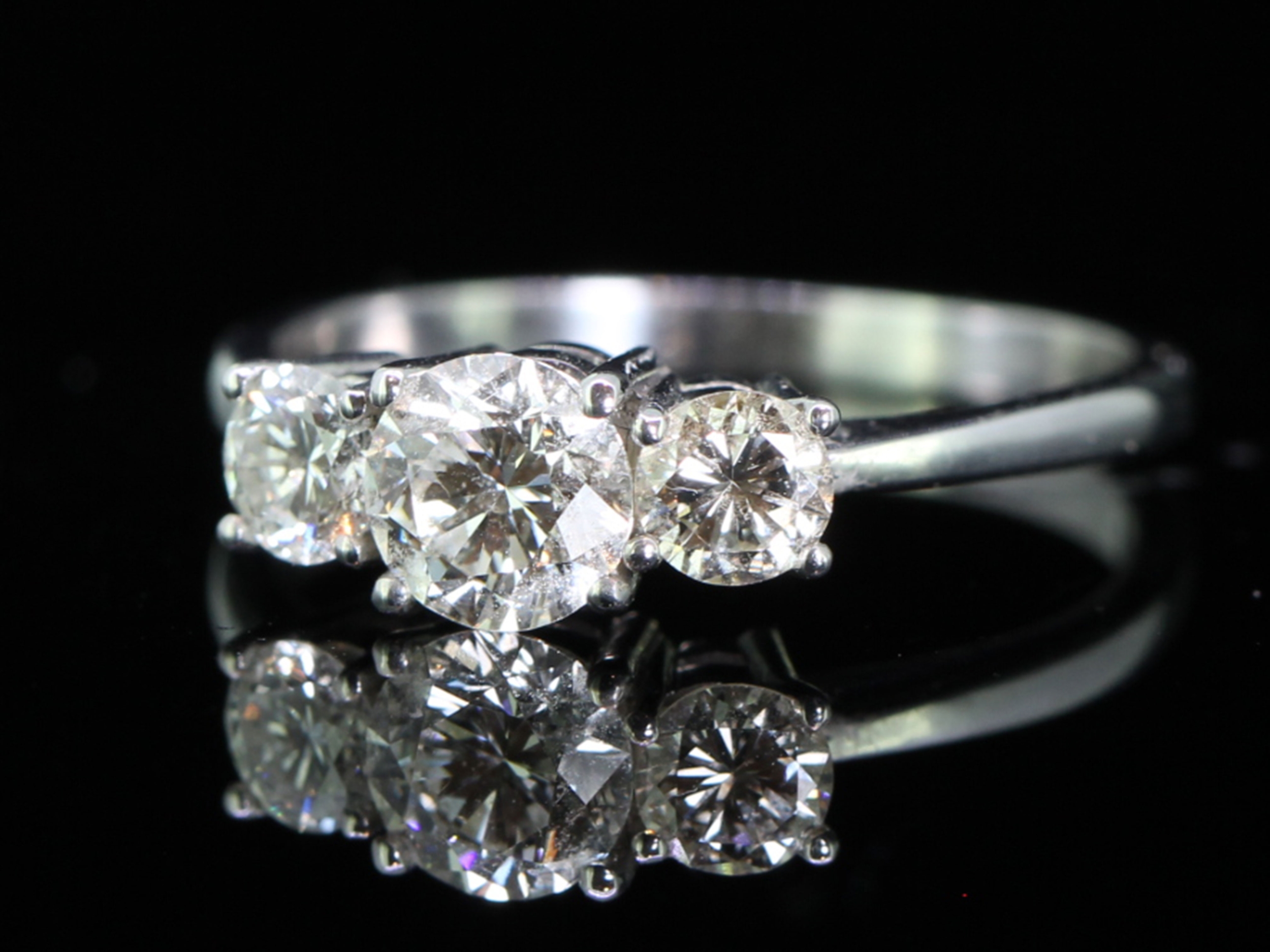 Beautiful and eye-catching diamond platinum trilogy ring