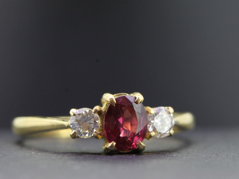 Lovely ruby and diamond 18 carat gold trilogy ring
