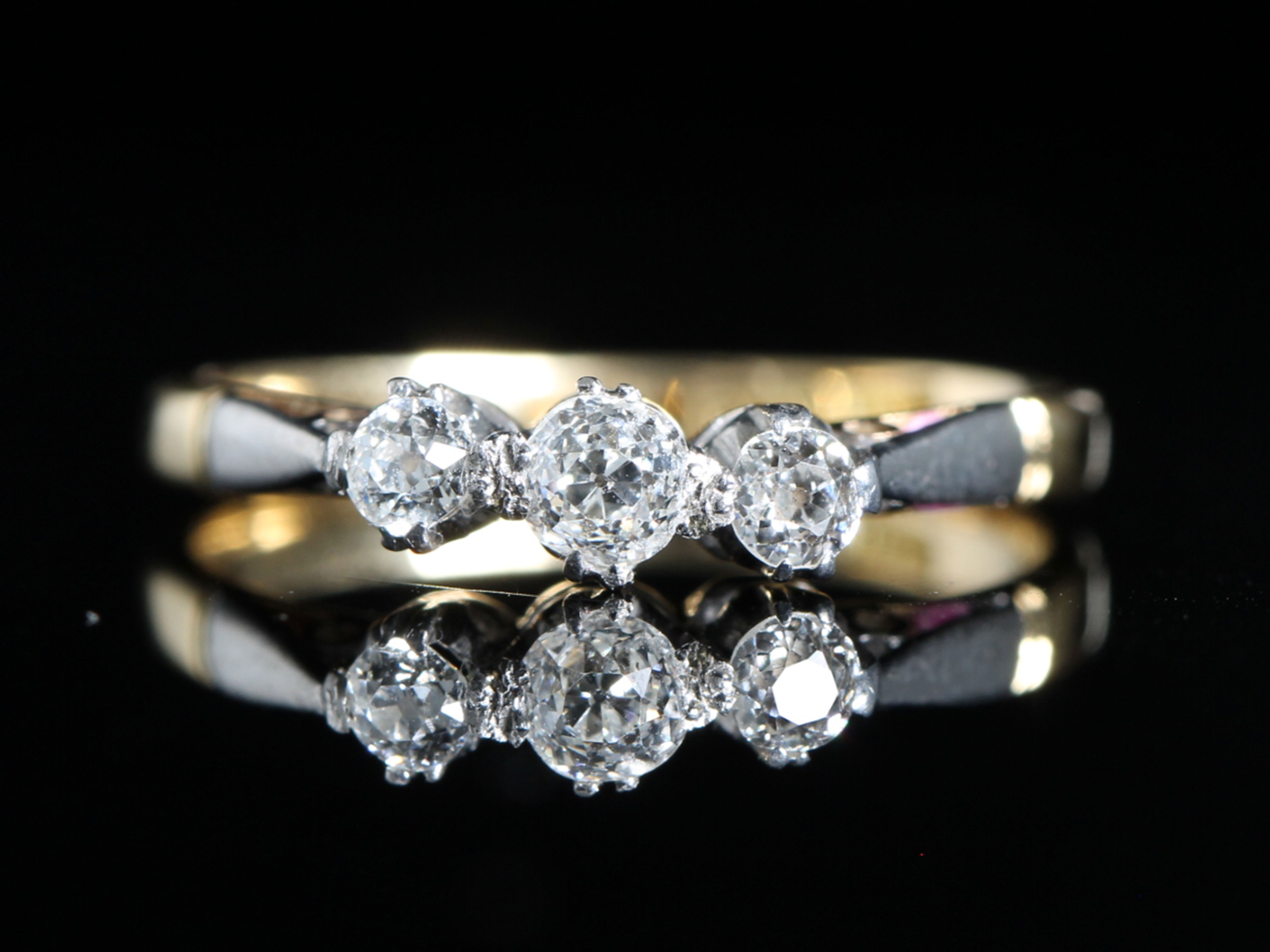Art deco diamond platinum and 18ct gold trilogy ring