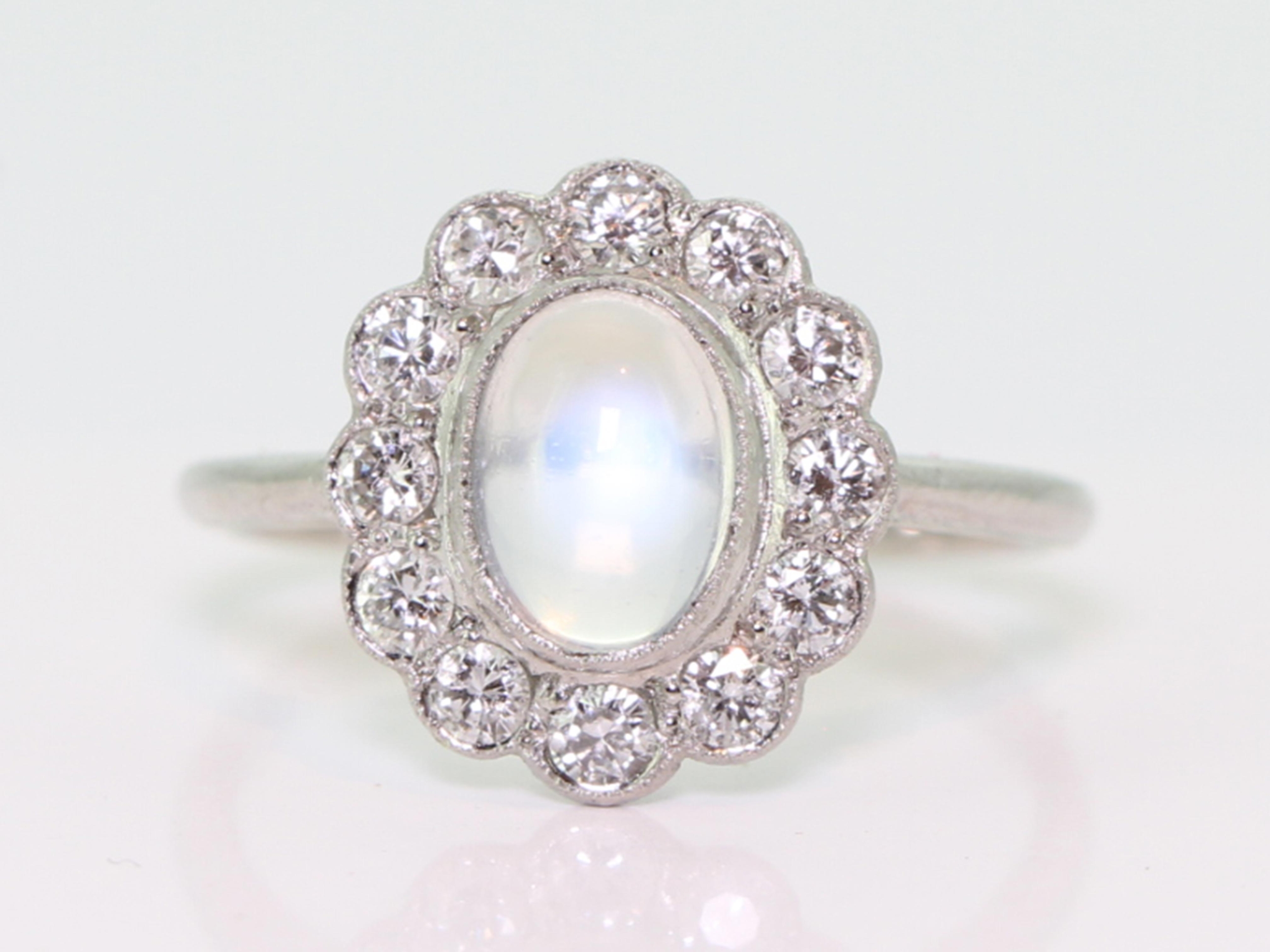 Dramantic moonstone and diamond platinum cluster ring