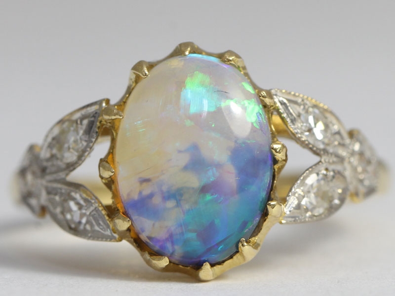 Stunning black crystal opal and diamond edwardian inspired 18 carat gold ring 