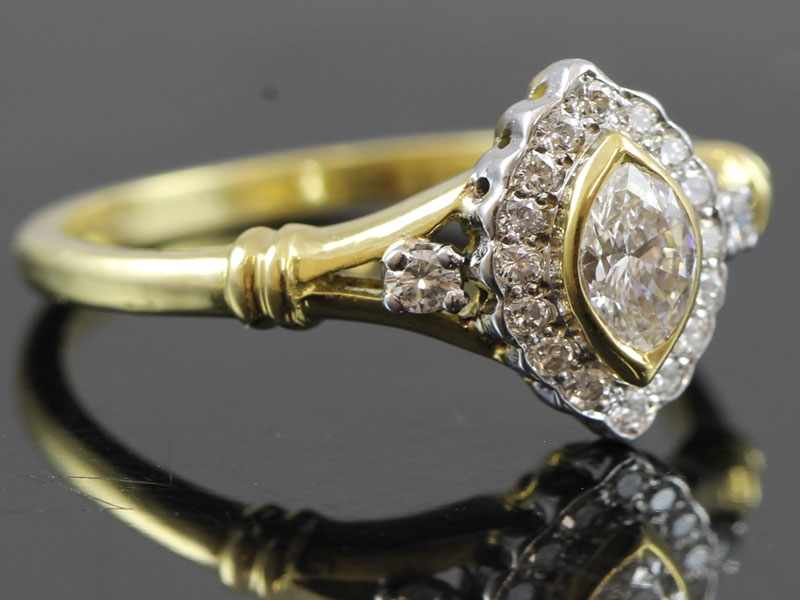 Elegant marquise cut diamond cluster 18 carat ring