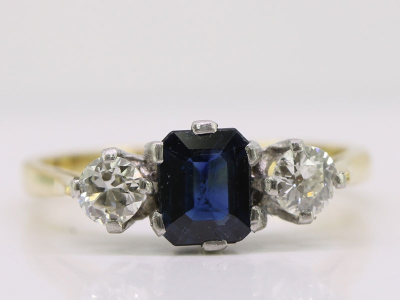 Stunning sapphire and diamond 18 carat gold trilogy ring