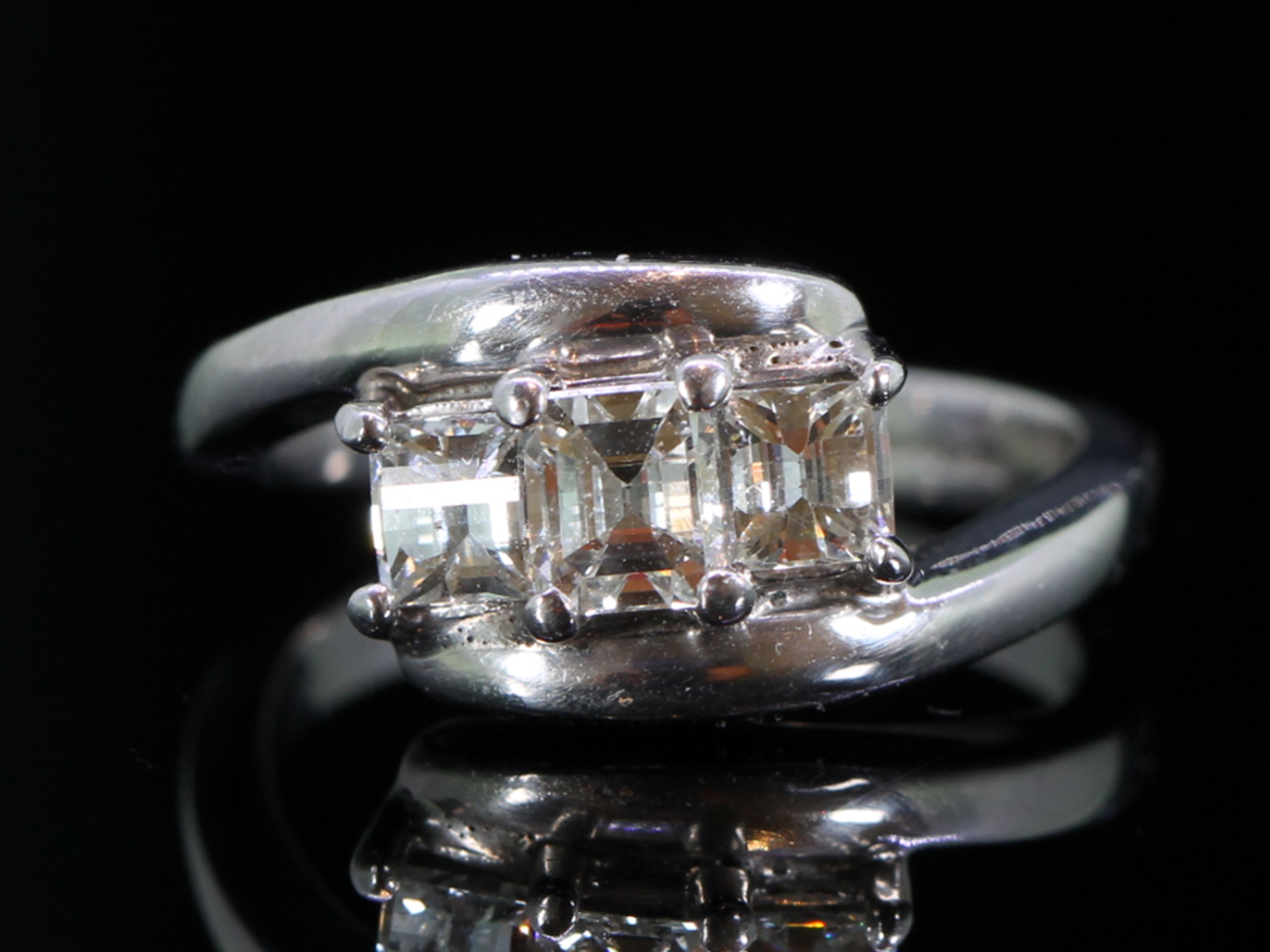 Unique millennium cut diamond trilogy platinum ring