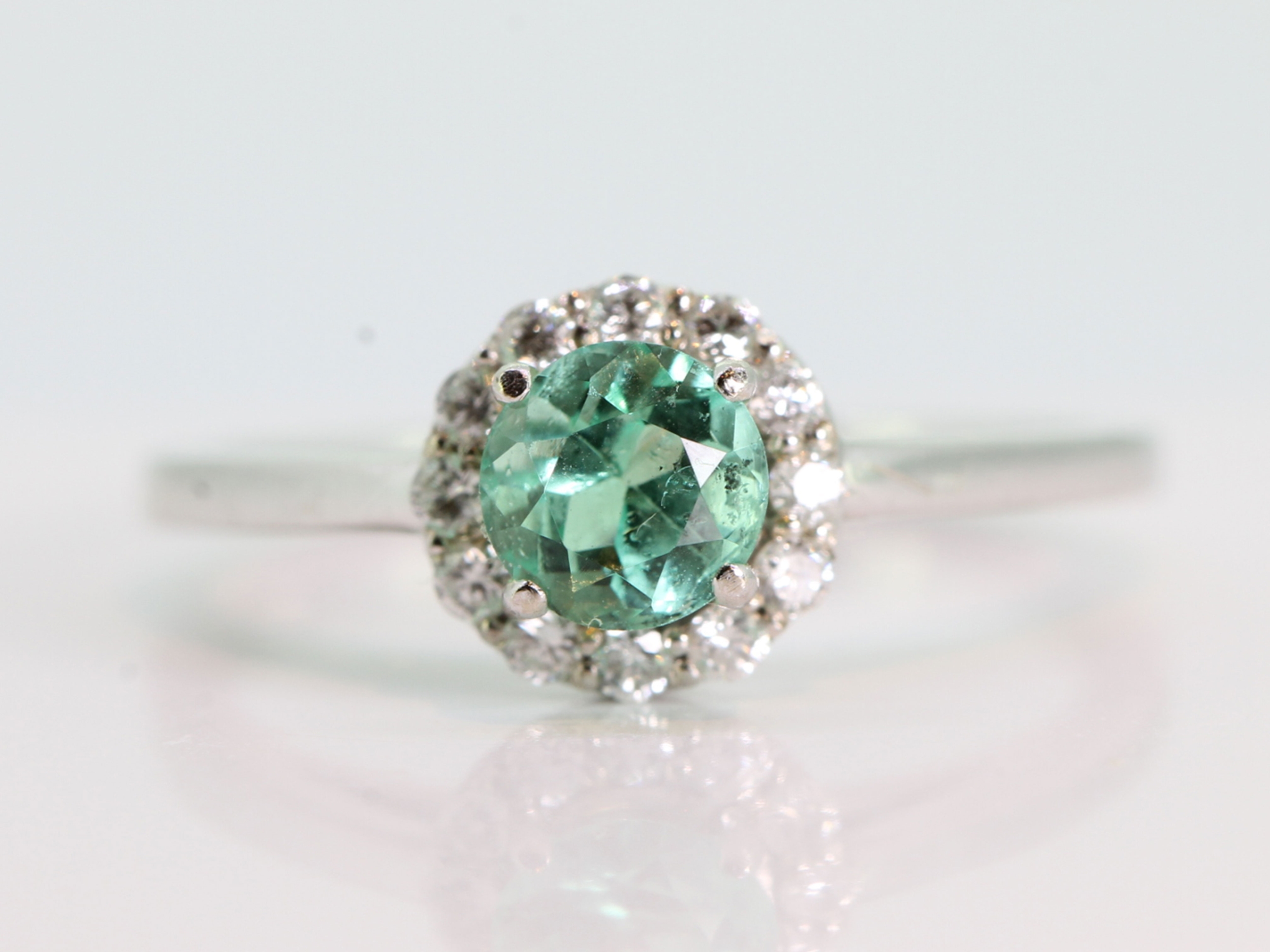 Pretty colombian emerald and diamond 14 carat gold cluster ring