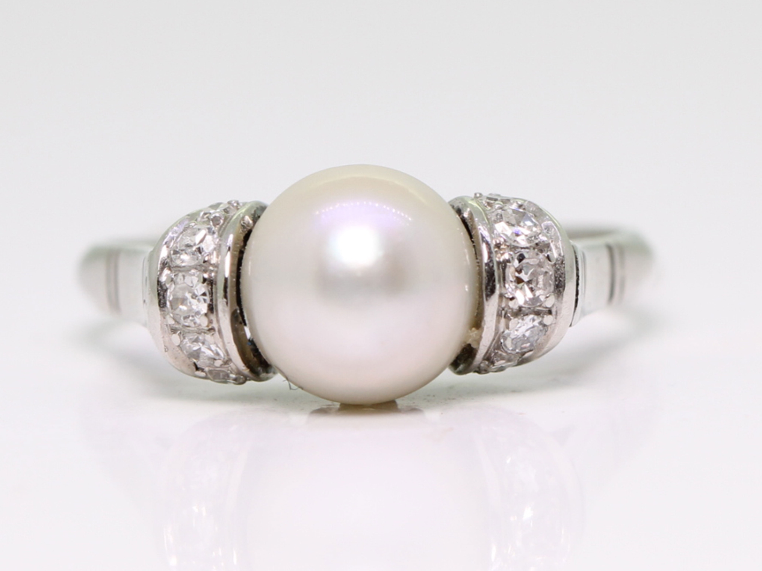 Art deco pearl and diamond platinum ring