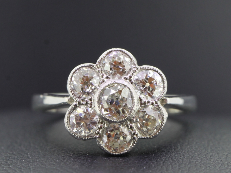 Beautiful diamond daisy platinum ring