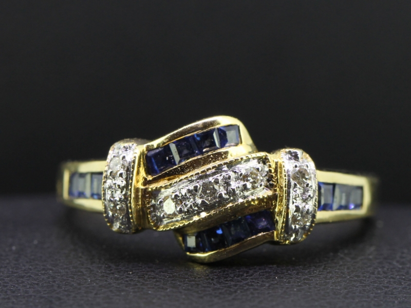 Sophisticated diamond and sapphire 18 carat gold ring