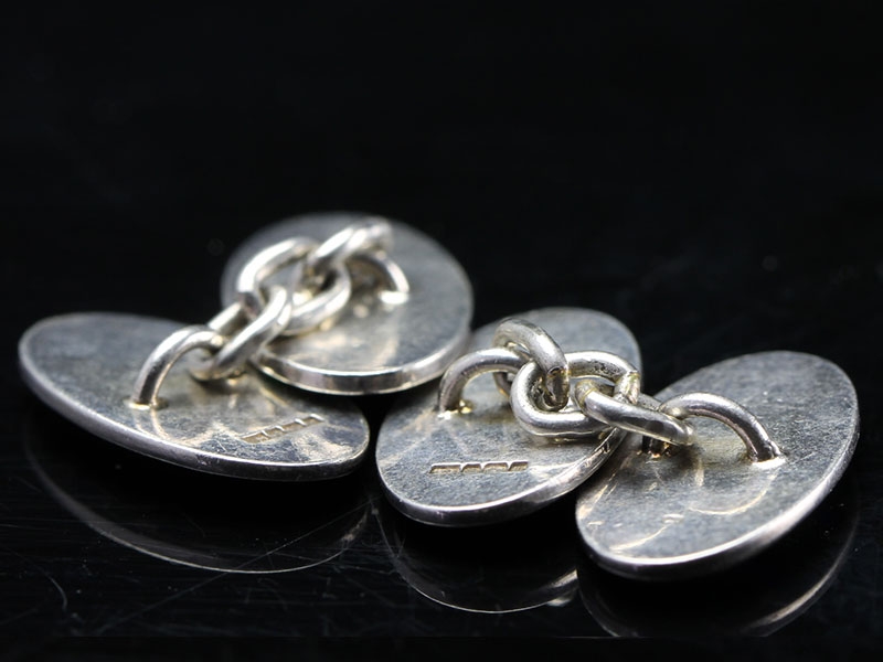 Distinctive chequered silver cufflinks