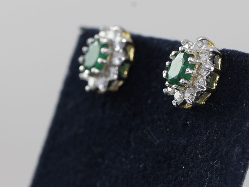  fabulous emerald and diamond 18 carat gold stud  earrings