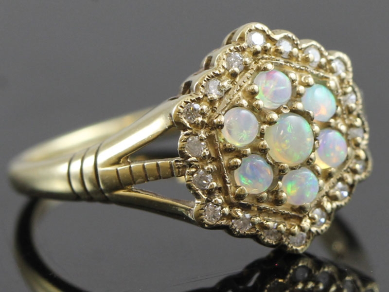 Gorgeous opal and diamond 9 carat ring